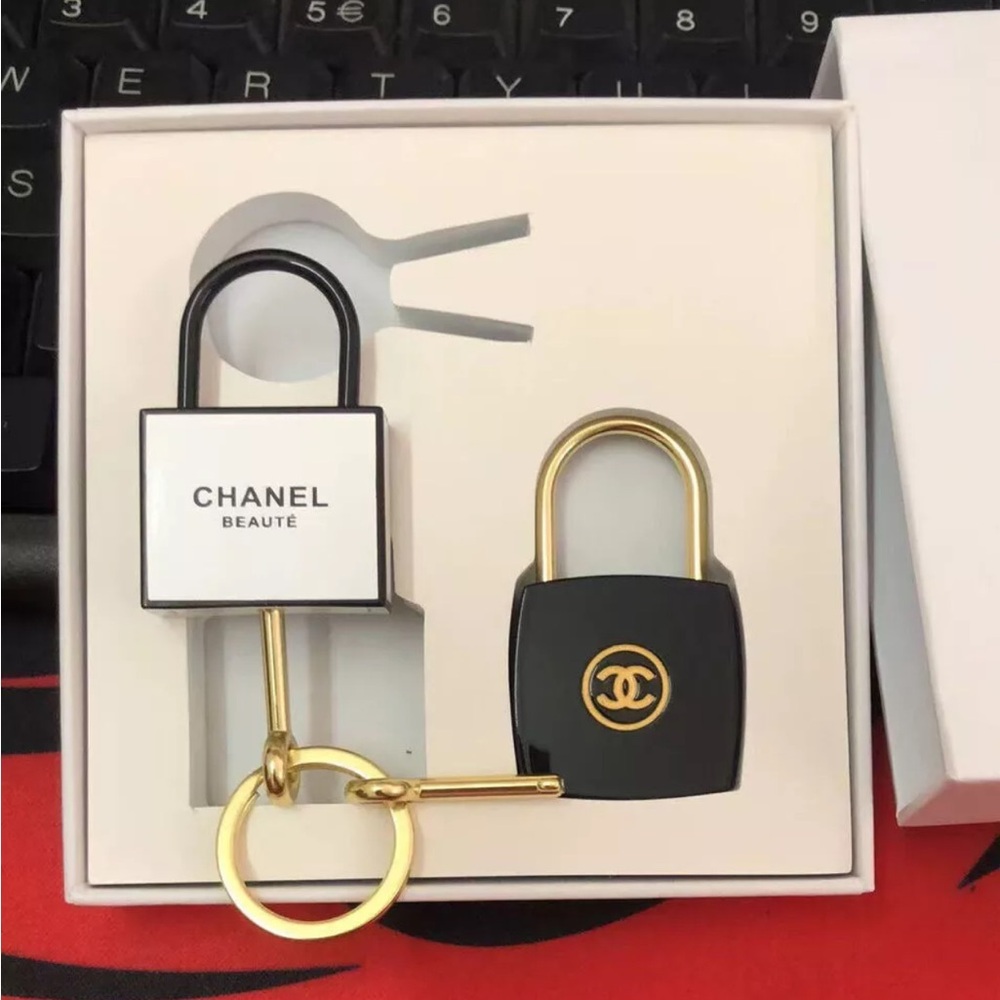 CHANEL Black and White Lock or Keychain Set with Gold keys
Brand New in Box - Picture 7 of 9